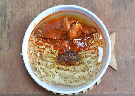 instant noodle with mackerel in ketchup canの写真素材