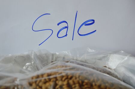 pet food plastic bag packing for sale in shopの写真素材