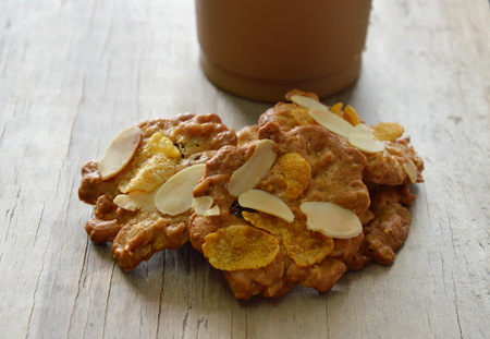 cereal cookie and ice coffee in plastic cup