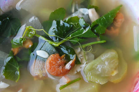 Thai spicy mixed vegetable soup with dried prawnの写真素材