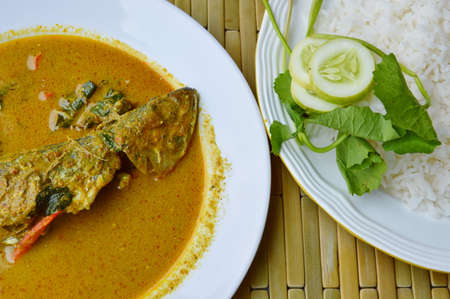 mackerel in red curry eat couple with rice and vegetableの写真素材