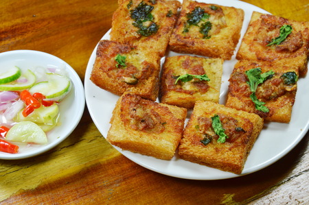fried bread with chop pork spread eat couple with pickled vegetable sauce