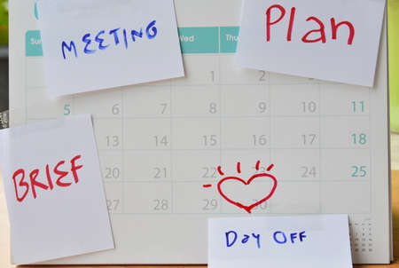 paper note for vacation remind stick on calendar