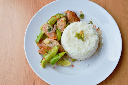 Chinese sausage spicy and sour salad eat couple with plain riceの写真素材