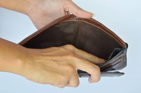 hand try to pick money in wallet but empty