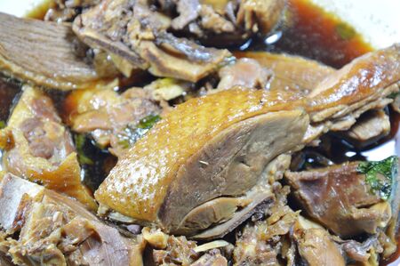 steamed duck meat in Chinese brown soup on plateの写真素材