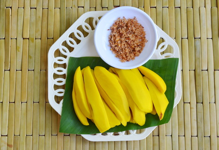 mango compote sweet and sour taste dipping with salt pepperの写真素材