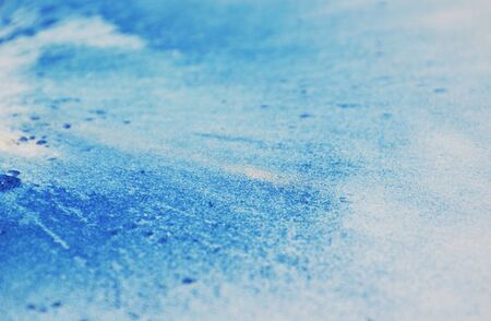 color powder spread on white paperの写真素材