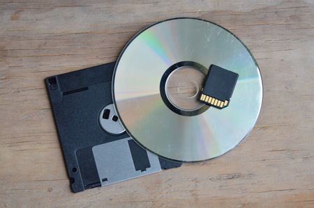 diskette with DVD and SD card development for computerの写真素材