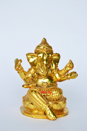 golden Ganesha statue Hinduism elephant head god worship for luck and successの写真素材