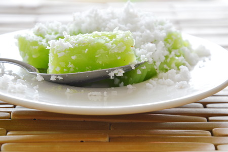 green coconut sweet pudding on spoon
