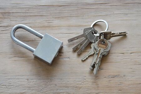 master key and key chain for find matching on wooden board