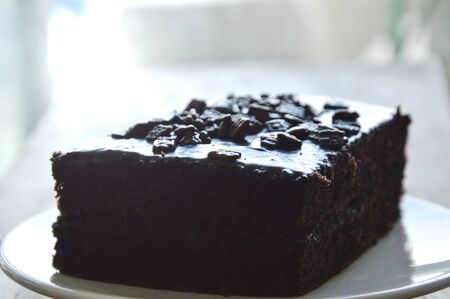 chocolate butter cake on dishの写真素材