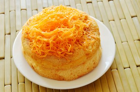 egg golden threads cake on dishの写真素材