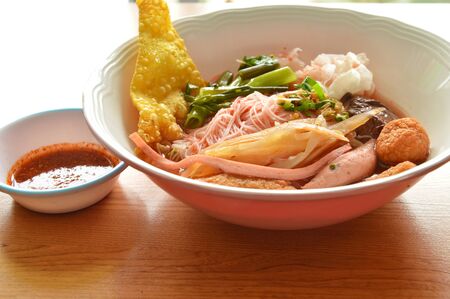 rice vermicelli with fish line and pork blood in red soupの写真素材