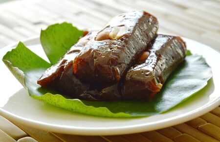 Thai sweet coconut caramel decorating on lotus leafの写真素材