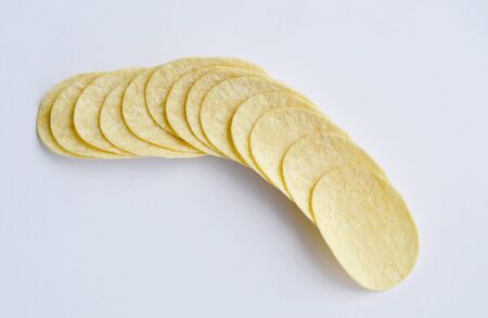potato chips arranging on white backgroundの写真素材