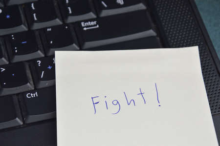 paper note write better tomorrow stick on computer notebook for cheer upの写真素材