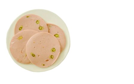 pork bologna stuffed chili on dish in white backgroundの写真素材