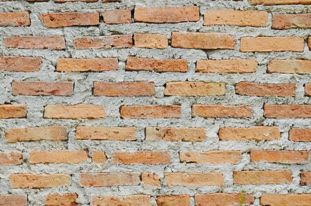 red brick wall merged by cement background and texture
