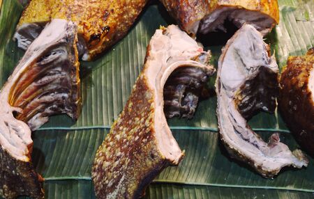 roasted crispy pork rib on banana leafの写真素材
