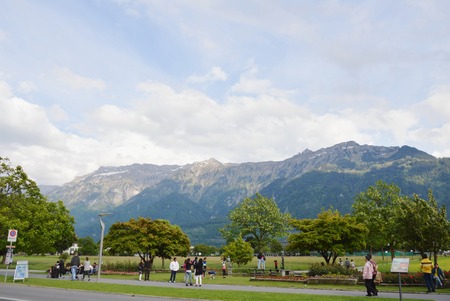 Interlaken Switzerland June 1, 2014 : tourist photo and relaxing at the park in Interlaken cityのeditorial素材