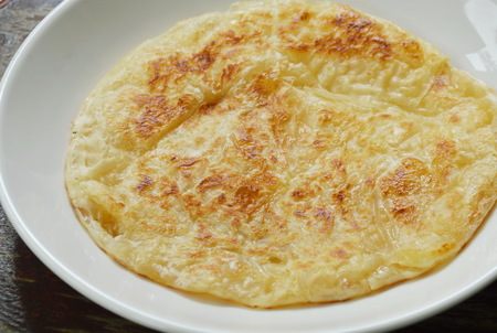 baked roti southern flat bread on plateの写真素材