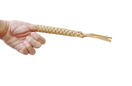 Thai folk wisdom toy equipment by putting finger in hole tight and move for protect trigger fingerの写真素材