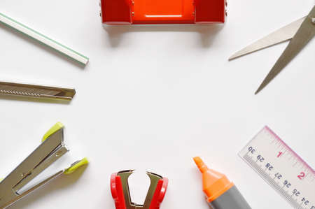 variety stationary arranging on white paper