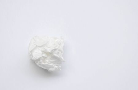 facial tissue paper crumbling on white backgroundの写真素材