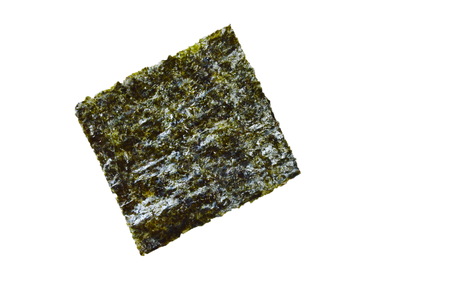 raw seaweed for cooking on white backgroundの写真素材