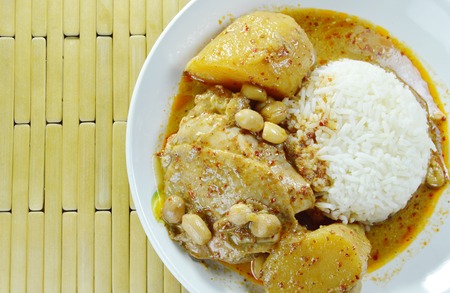 chicken curry and potato with rice on plateの写真素材
