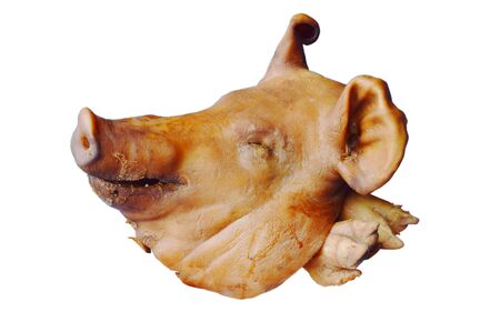 pig head and leg for offering goddess on white backgroundの写真素材