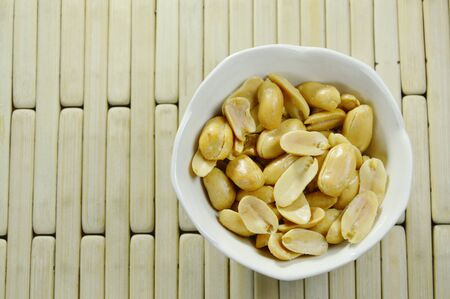 baked salt peanuts on little cup