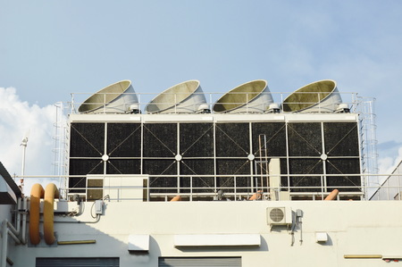 big ventilation chimney on building roof