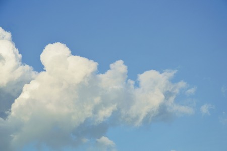 big cloud spreading on sky in sunny dayの写真素材