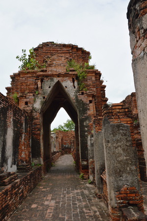 ancient and ruin hallway at Nakhon Luang castle Thailandの写真素材