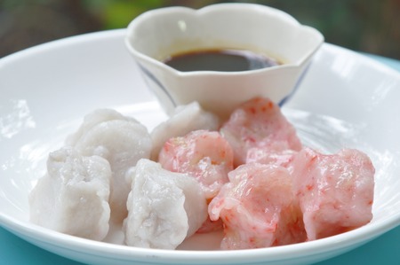 steamed Guizhou or dumpling stuffed chop bamboo shoot and mashed taro dipping with soy sauceの写真素材