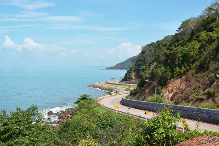 landscape of curve road and sea from Nang Phaya hill scenic point in Thailandの写真素材
