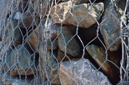 rock wall protect with wire on Nang Phaya hill scenic point in Thailandの写真素材