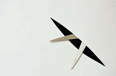 scissor blade cutting on white background