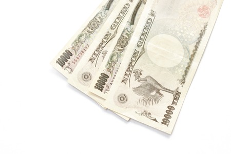 Japanese yen banknote on white backgroundの写真素材