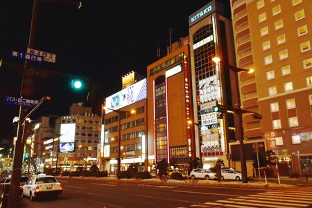 Hokkaido Japan March, 4 2019 : building and LED advertising  banner on Tanukikoji walking street in Sapporo at nightのeditorial素材