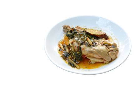 steamed spicy chicken thigh and leg with herb and chili on palteの写真素材