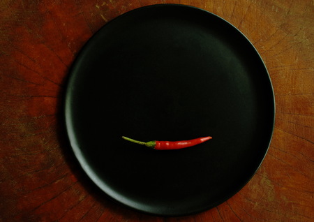 red chili herb and ingredient on plateの写真素材