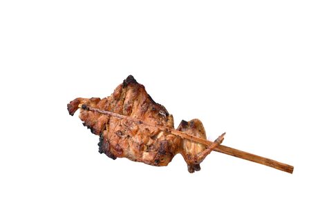 roasted chicken in wooden stick on white backgroundの写真素材