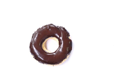 chocolate cream donuts on white backgroundの写真素材