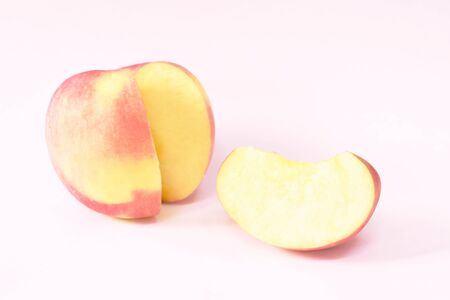 piece of red apple cutting on white backgroundの写真素材