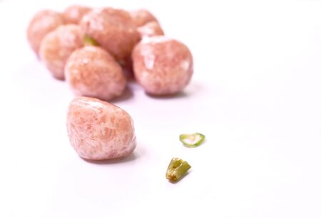 fermenting minced pork with slice chili Thai sausage on white background