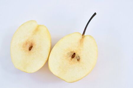 Chinese pear healthy fruit half cut on white background